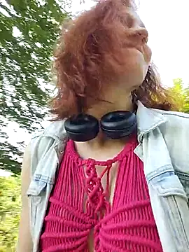 Playing in the park,  watering  plants with  nature juice - video by Exhibitionsplit cam model