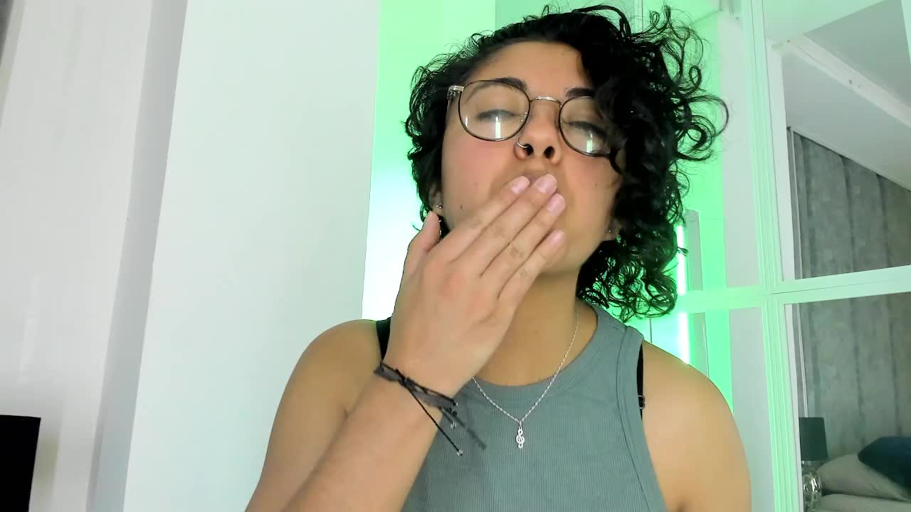 Curly haired Latina plays with her big tits and shaking her body for you - video by Amareto_ cam model