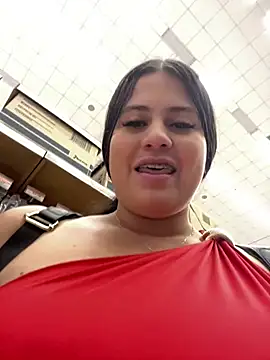 Naughty girl showing her breasts in public