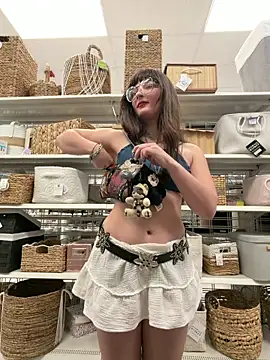 sucking a dildo in a store 🥵