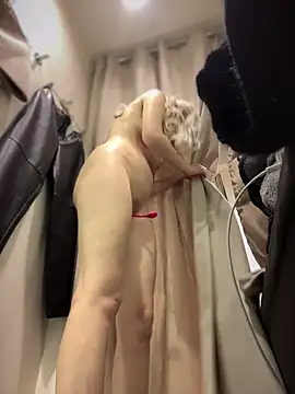 Pussy fingering in the fitting room, going naked behind the curtain