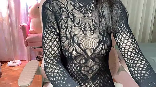 Masturbating on the floor, fucking with a dildo.