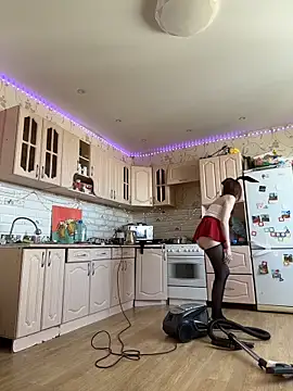 She's using the vacuum cleaner again wrong