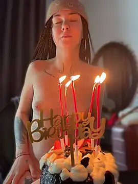I blow out the candles for my birthday naked