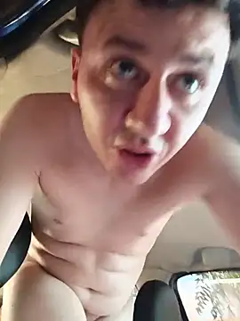 Here, fucking in the car with a big dildo.