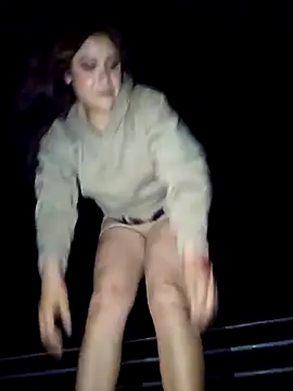 Playing in the dark of the street.