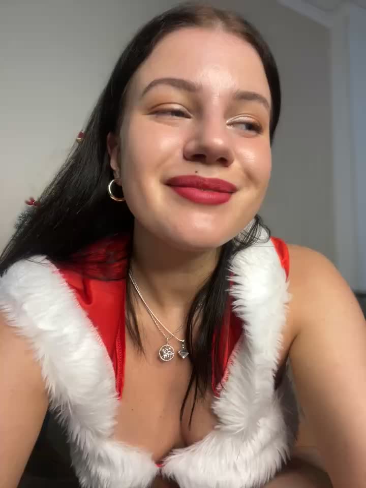 Lika in a Santa costume fucks a hairy pussy