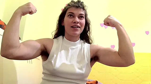 getting my gym outfit on and flexing, then get naked and flex some more, then finger my hairy pussy - video by MercyLove cam model